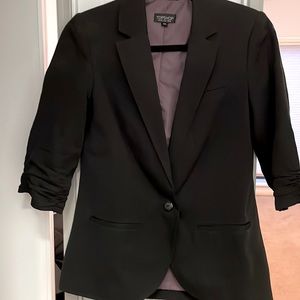 Topshop Black boyfriend style blazer with ruched sleeves and button closure.